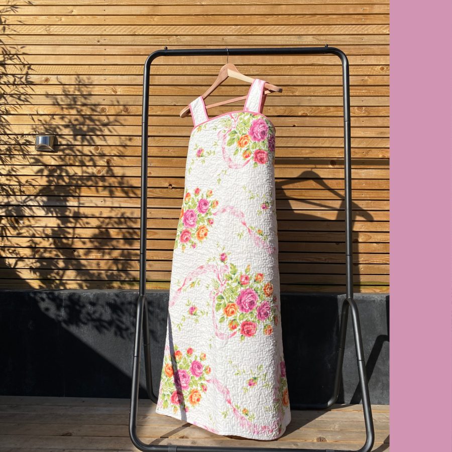 Floral print dress from upcycled materials. Meet the designer bringing joy to pre-loved fashion: Freya Simonne founder Freya Rabet's zero-waste mindset creates one-of-a-kind gems.
