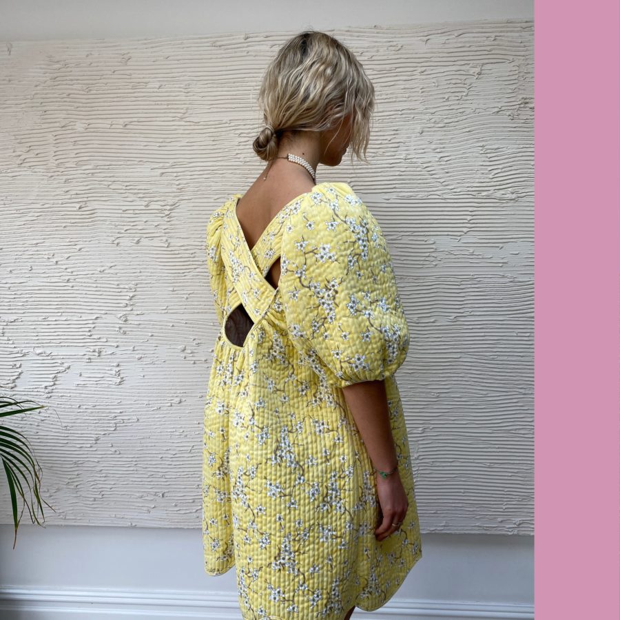Yellow print puff sleeve dress from upcycled quilt. Meet the designer bringing joy to pre-loved fashion: Freya Simonne founder Freya Rabet's zero-waste mindset creates one-of-a-kind gems.