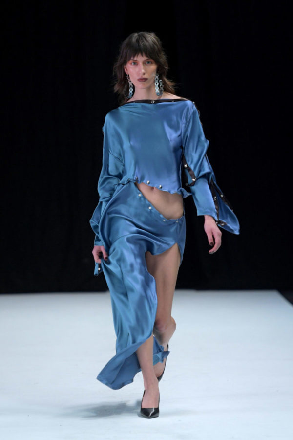 Jade cropper. Blue skirt and top. Calendar's edit of standout moments from Copenhagen Fashion Week AW22, including Ganni, Skall Studio and Jade Cropper.