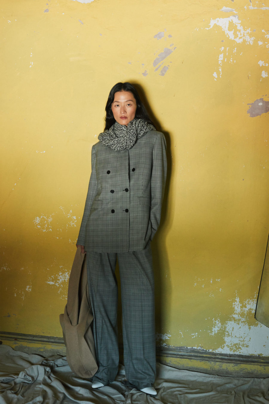 Woman wearing grey suit